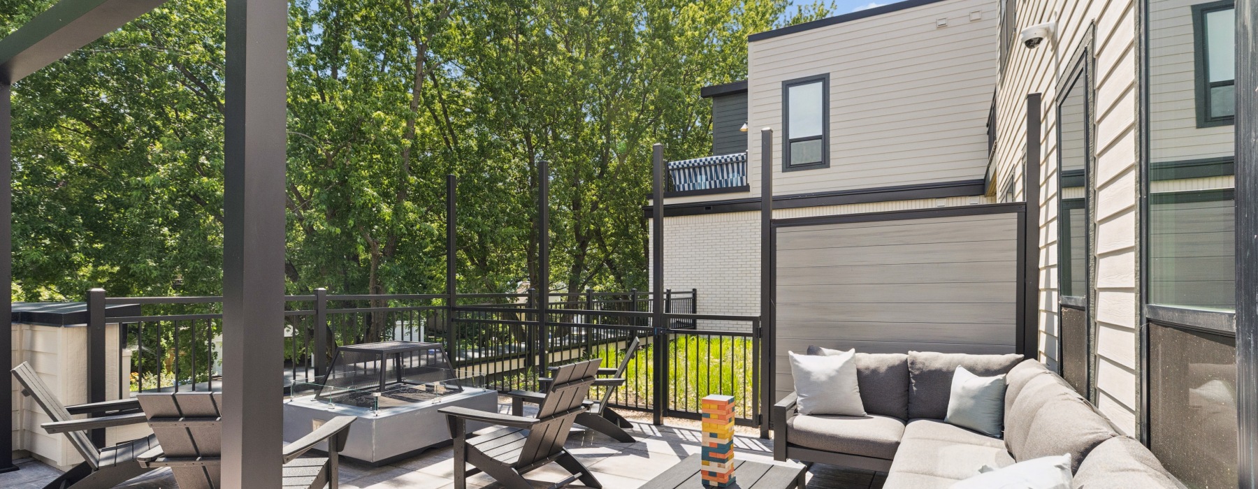 Patio space with seating areas and fire pit