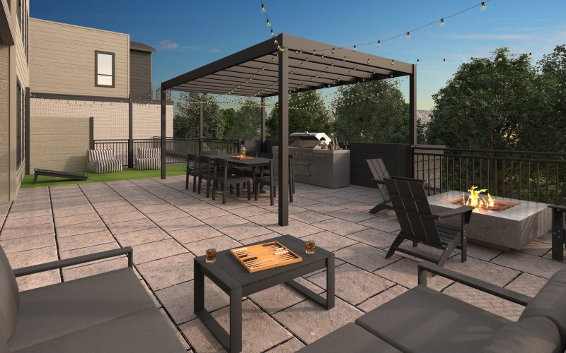 an outdoor sitting area with a fire pit